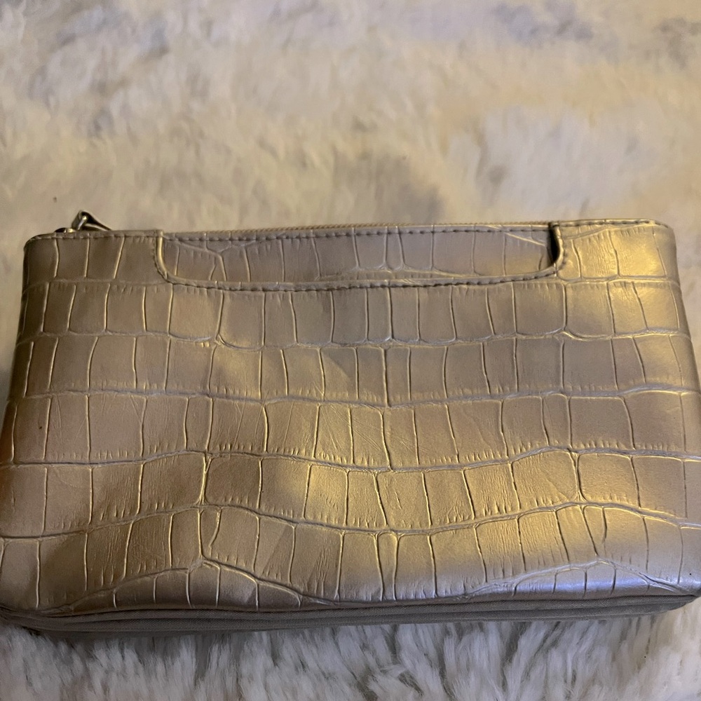 This is a large wallet with many cards compartments